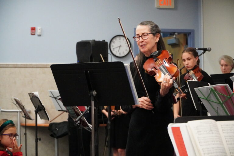 Violin lesson with teacher and student