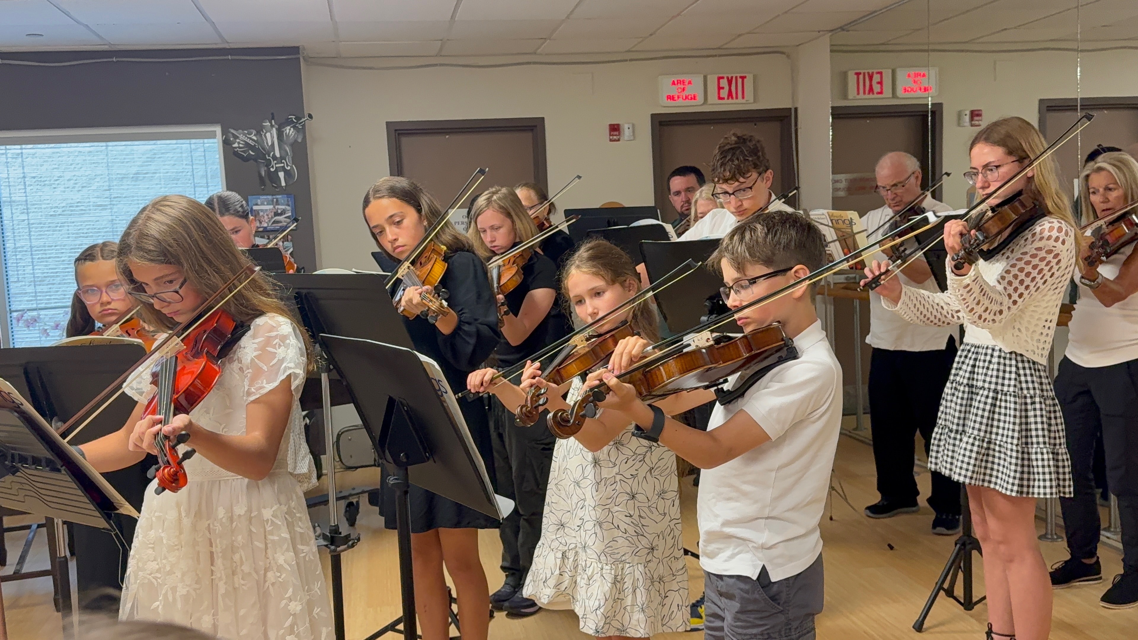 Students performing together at the Spring String Student Recital